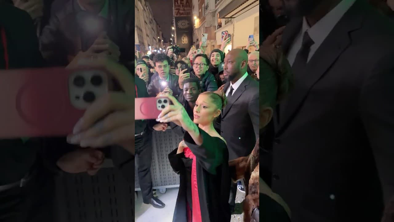 Ariana Grande showing all the love to fans at the Paris screening
