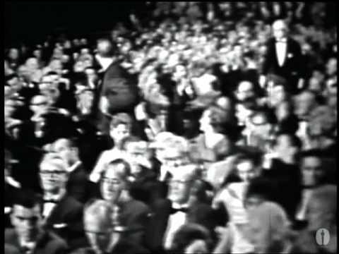 Billy Wilder winning the Oscar® for Writing‬‬‬‬ "The Apartment"