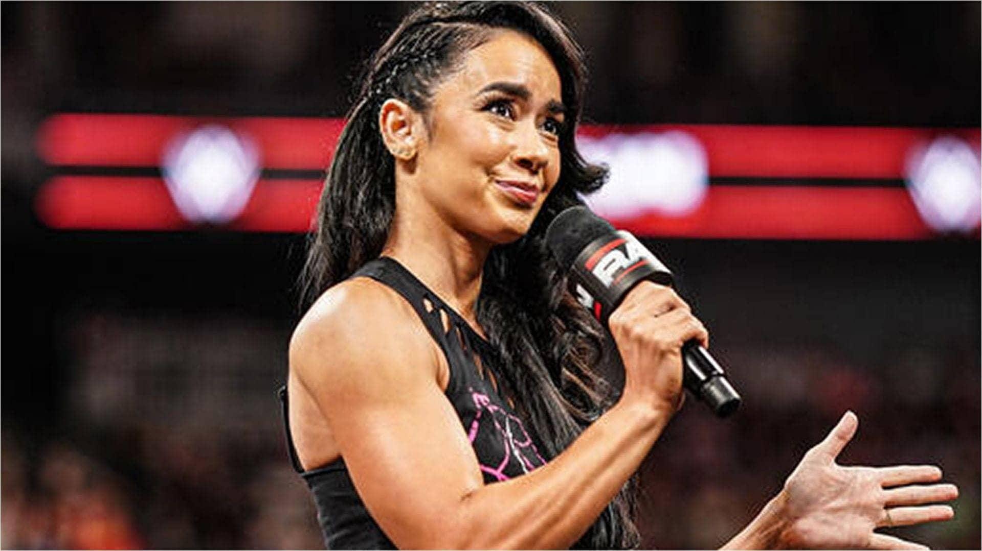 AJ Lee comes to the rescue of a rising star; gets taken out moments later