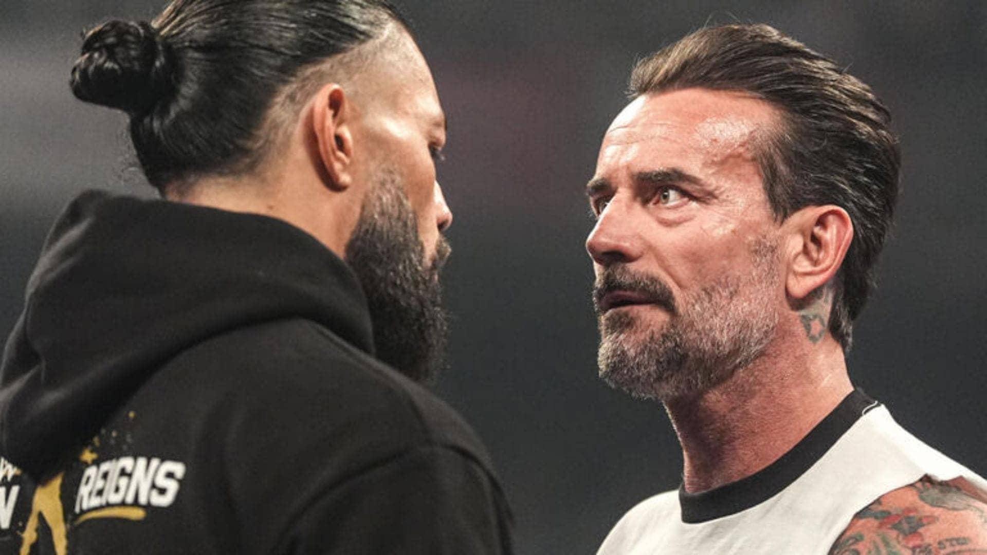 WrestleMania Drama: Roman Reigns Silent as CM Punk Roars!