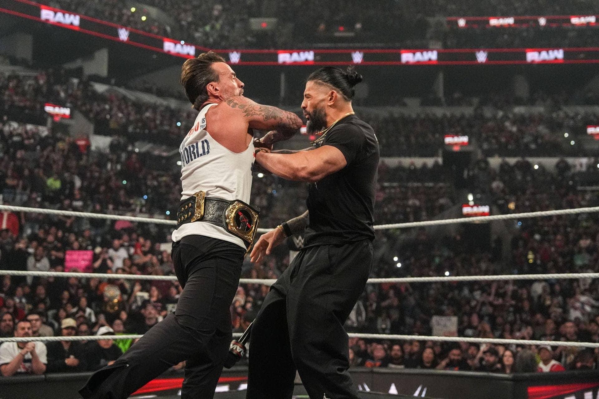 Roman Reigns Might Use Usos to Take Out CM Punk Before Mania