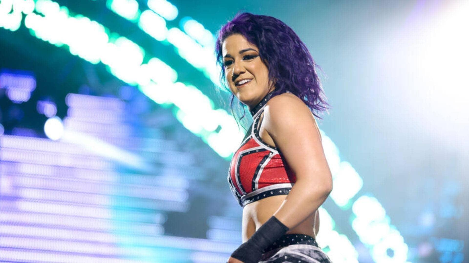 Bayley Calls Out Michael Cole: A Cowardly WrestleMania Challenge!
