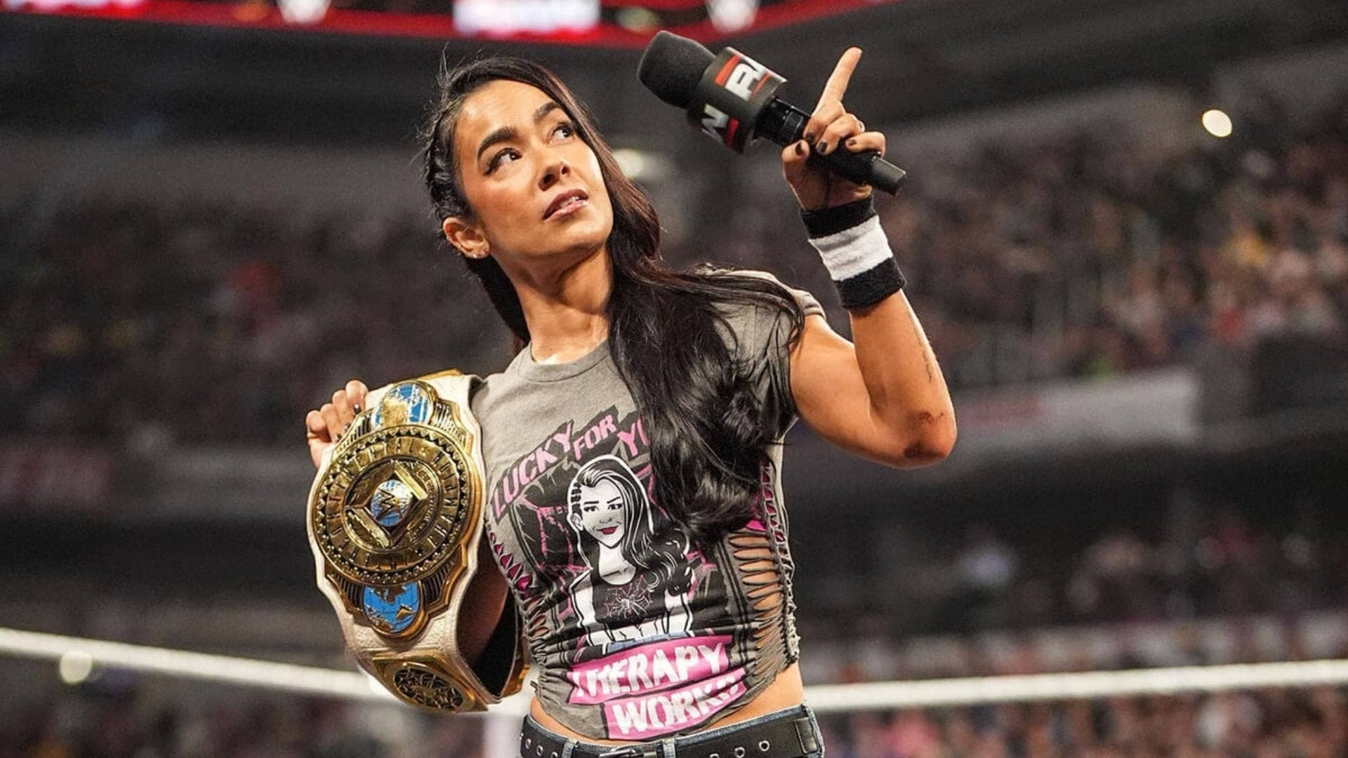 AJ Lee Shocks Fans with Championship Reveal Before WWE RAW
