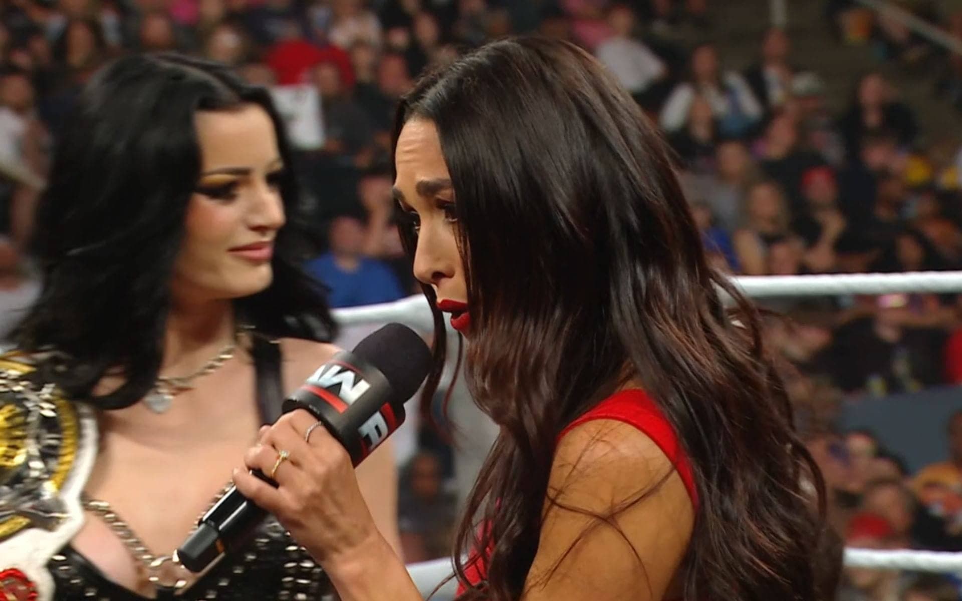 Brie Bella & Paige destroyed by top WWE faction on RAW to set up a huge Championship feud